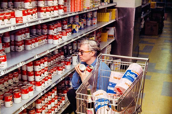 Illustration for: Andy Warhol in a New York supermarket, 1964. © Bob Adelman / The Andy Warhol Foundation for the Visual Arts