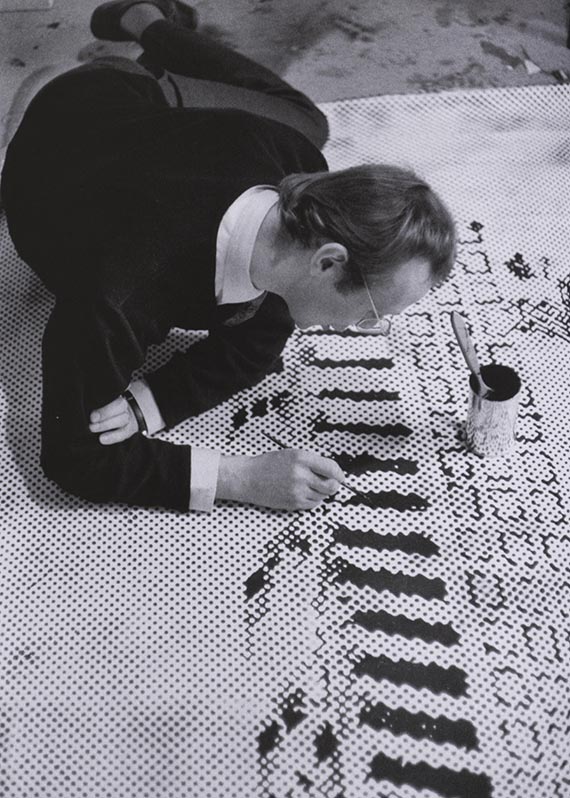 Illustration  for: Sigmar Polke working on the grid painting <i>H&auml;userfront</i> (building facade), 1967 in his D&uuml;sseldorf studio, photo: unknown. &copy; The Estate of Sigmar Polke, Cologne/ VG Bild-Kunst, Bonn 2026